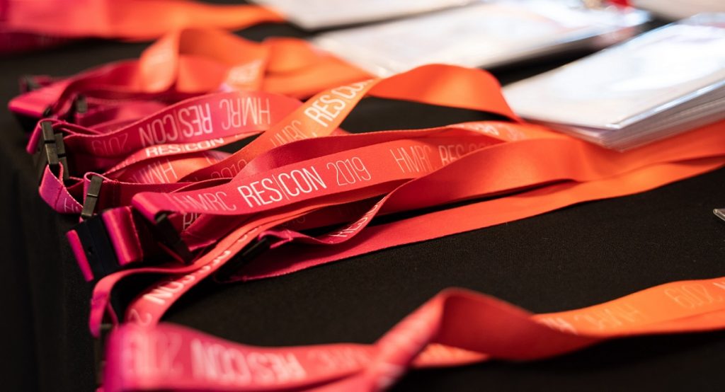 Image of the red lanyards used at the conference