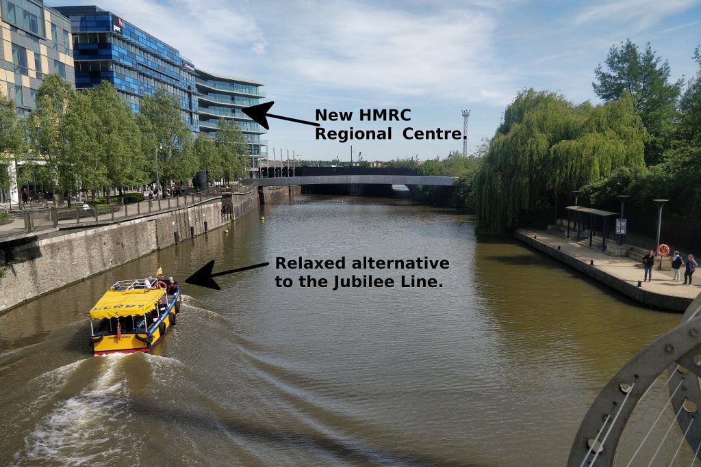An external view of the new Bristol Regional Centre showing a ferry on the river
