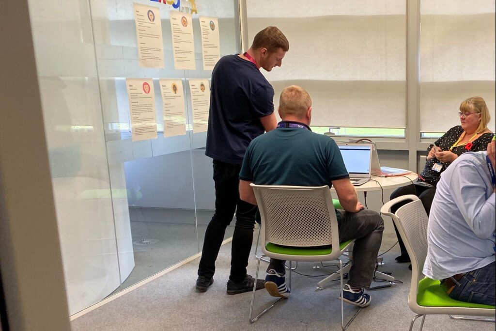 Matt Smith at work with other users researcher