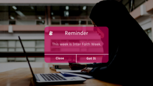 Reminder pop up (Pink) box with background image of woman in hijab